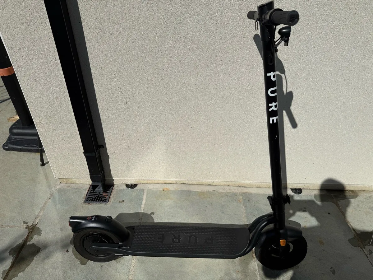 Pure Scooter and Charger - Image 1
