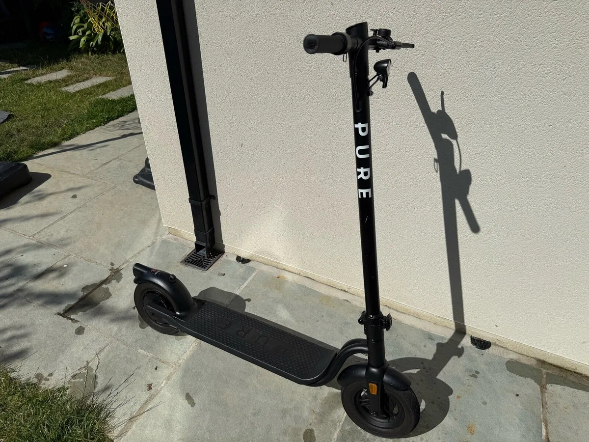 Pure Scooter and Charger - Image 2