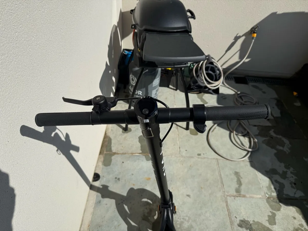 Pure Scooter and Charger - Image 3