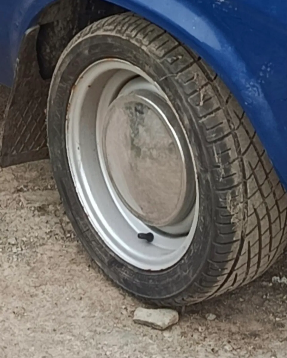 Lotus cortina wheels /suit escort
