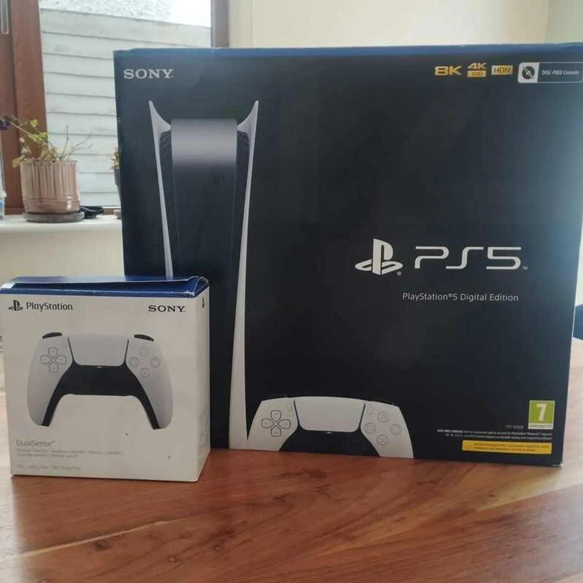 PS5 Digital Edition + 2 Controllers + Box - Image 1