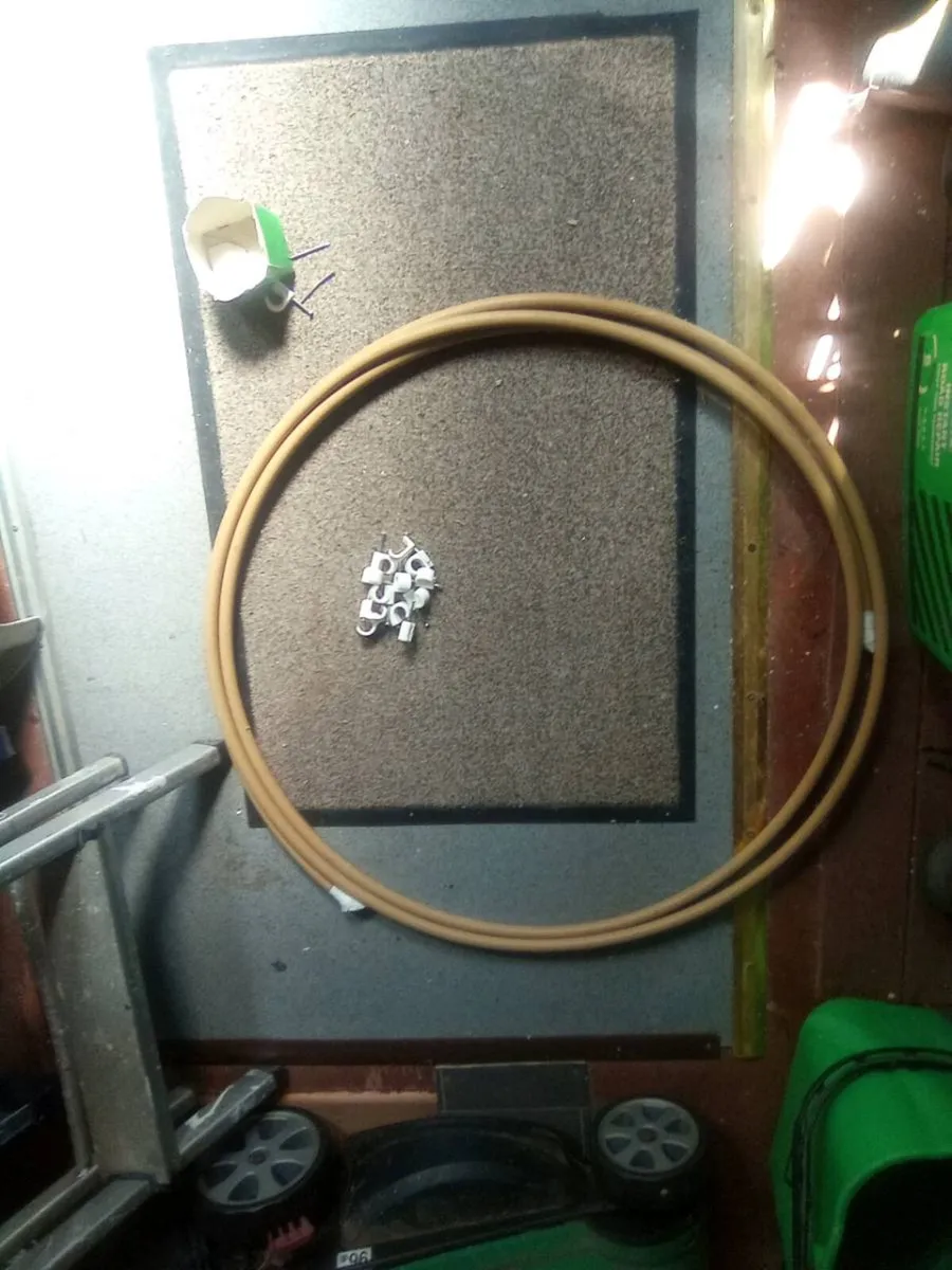 5. METRES.  OF. QUALPLAST. PIPING.  AND.  CLIPS - Image 1