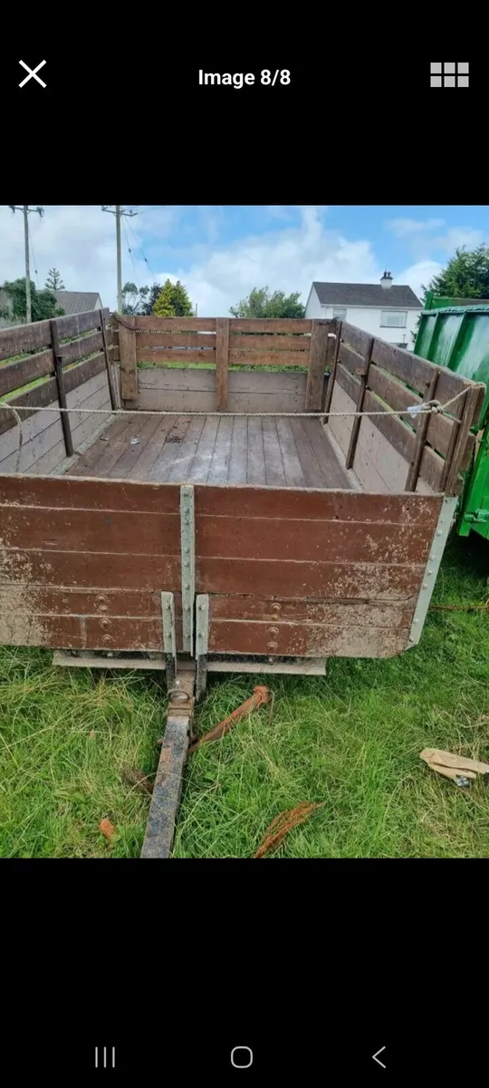 Tractor tipping trailer - Image 1
