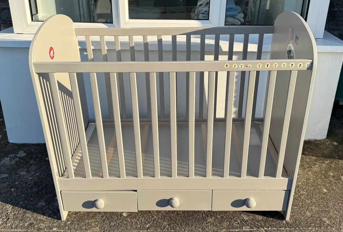 IKEA cot with three drawers