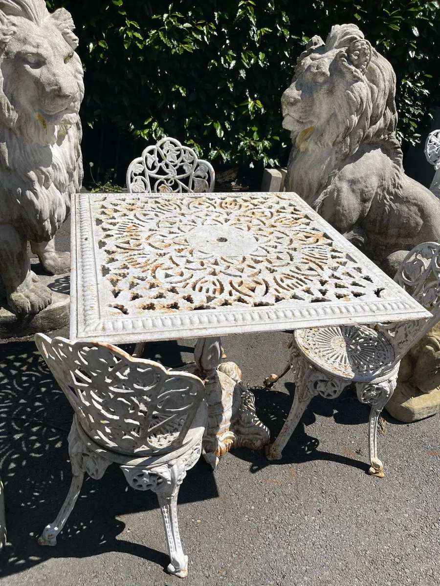 Heavy cast iron garden table chairs - Image 1