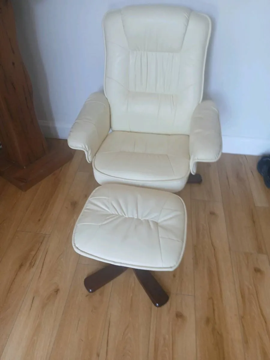 Leather recliner swivel armchair and foot stool