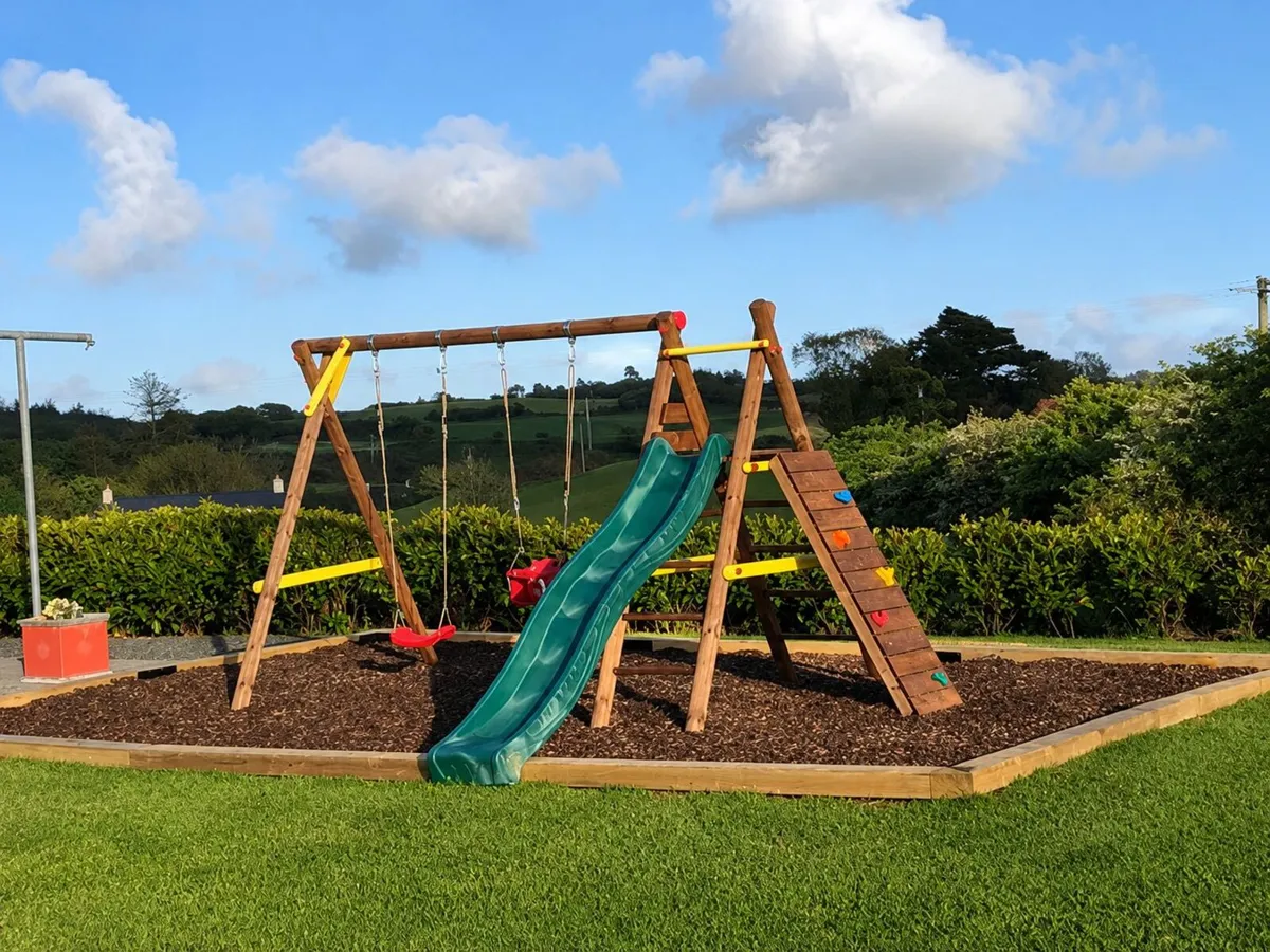 Bosse Wooden Swing Set with Slide & Climbing Wall - Image 2