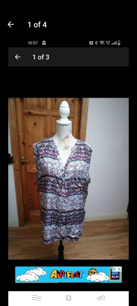 Lovely sleeveless top. New never worn.
Size - Image 1