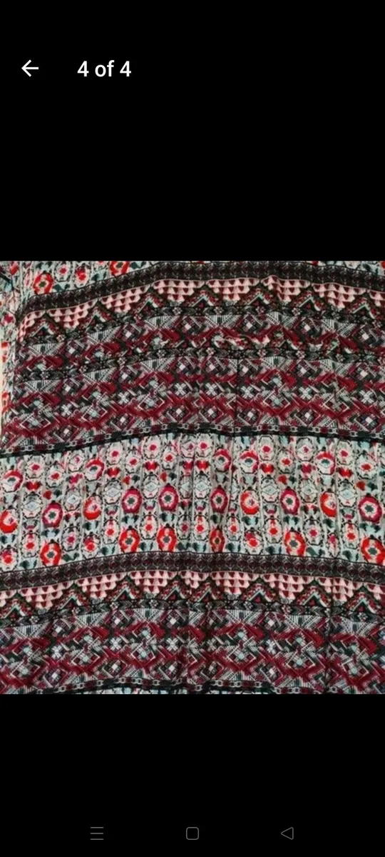 Lovely sleeveless top. New never worn.
Size - Image 4