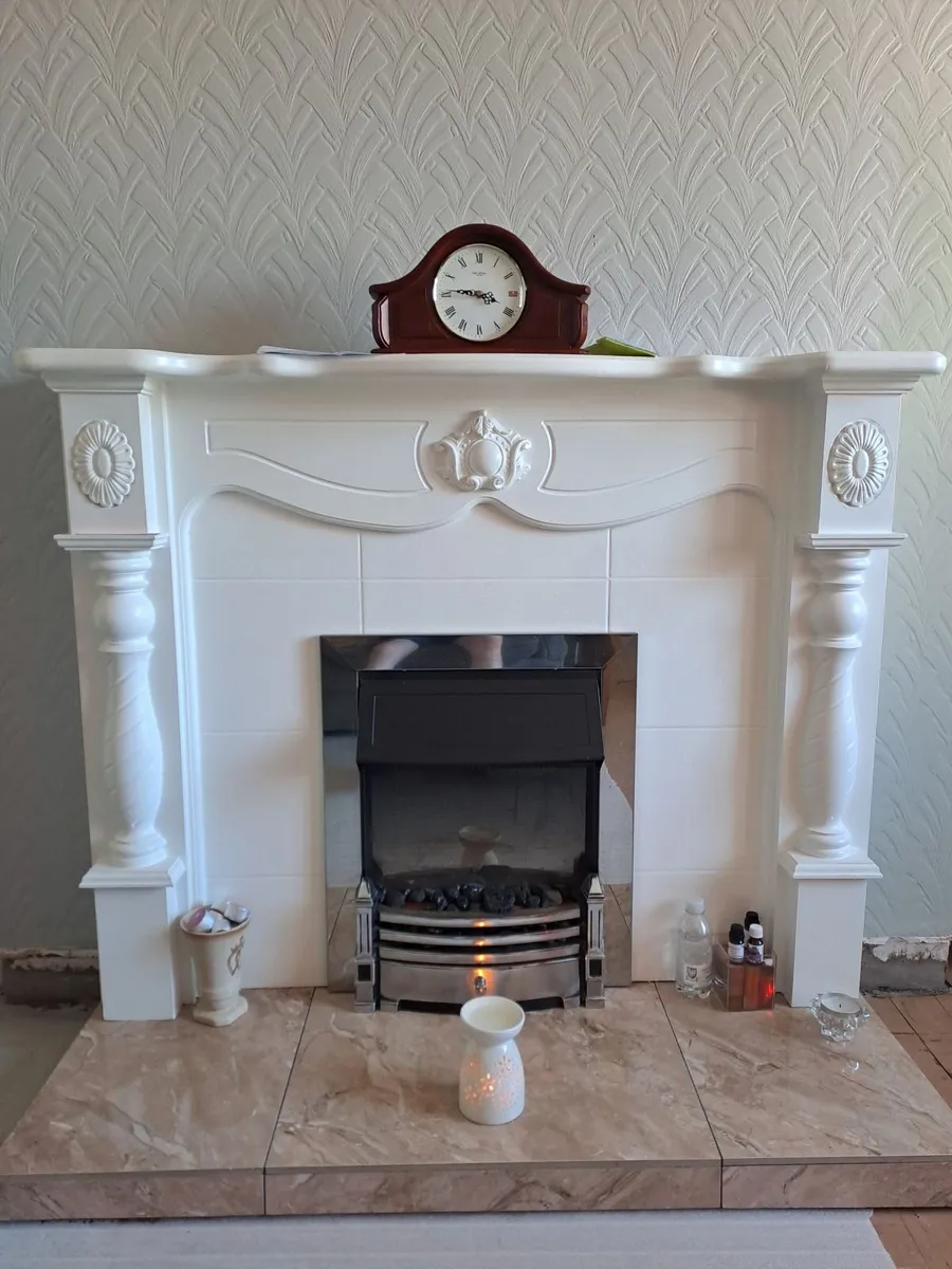 White painted fireplace surround