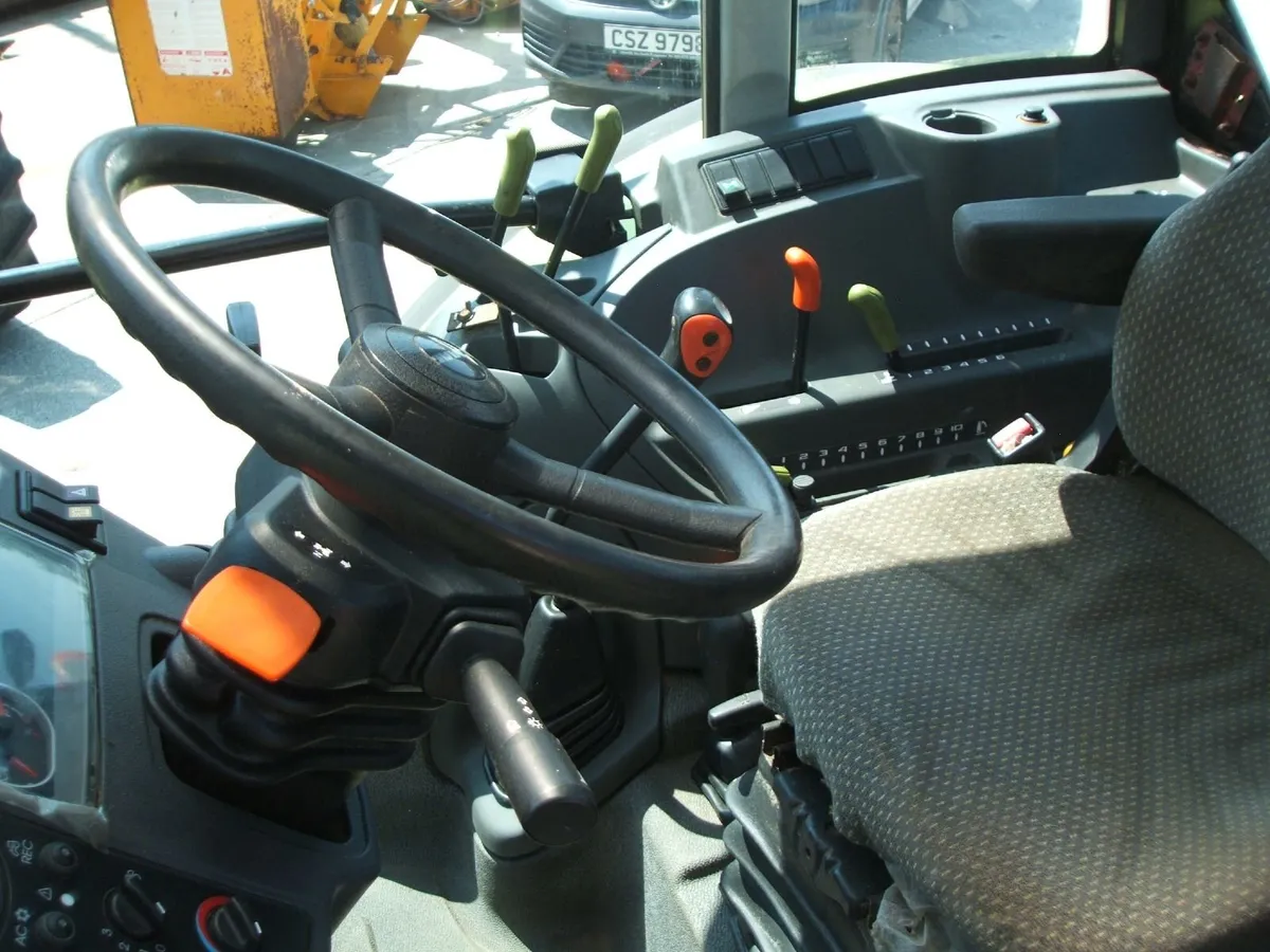 late 2015 Claas 340 Axos - Image 4