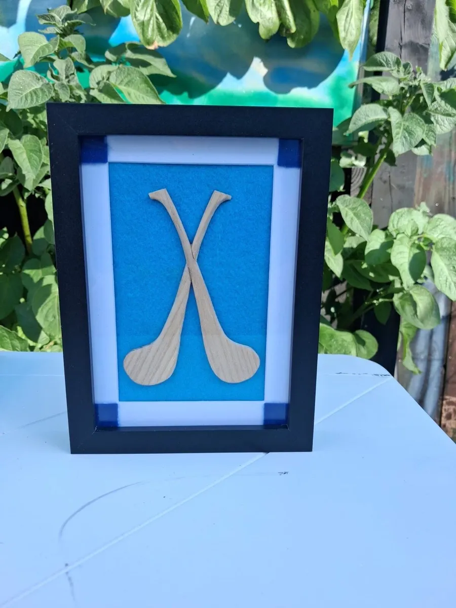 Hand made hurles in frame - Image 1