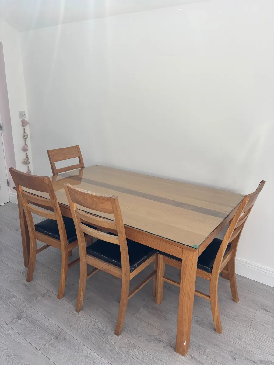 Glass top dining table & 6 chairs - Image 1