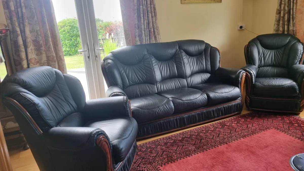 Three piece leather suite