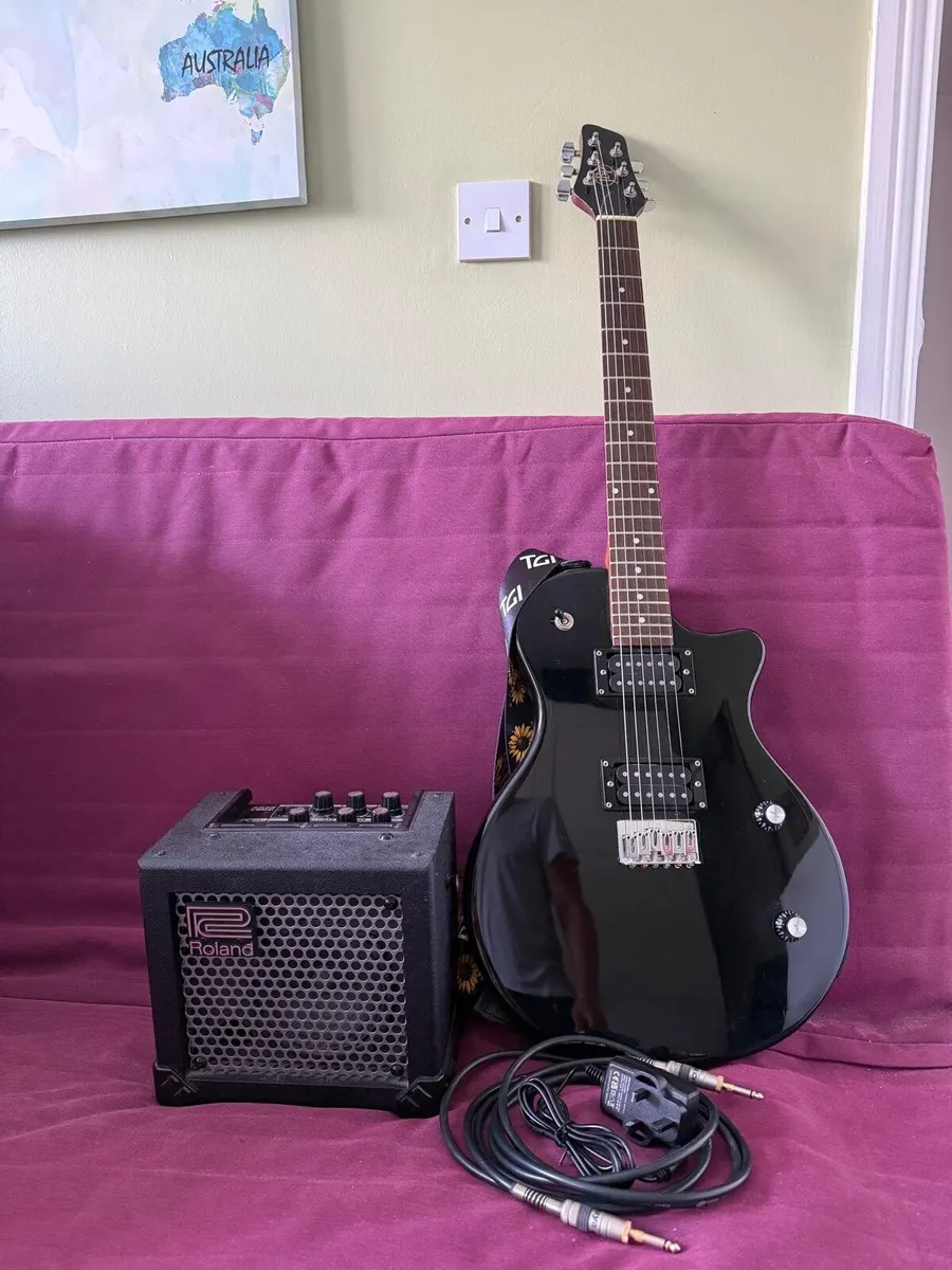 Electric Guitar and  Roland Amplifier - Image 1