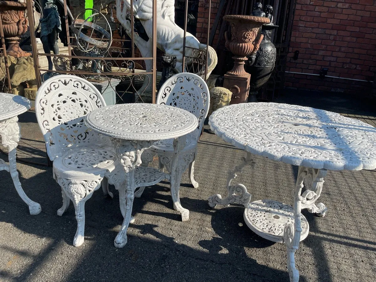 Heavy cast iron garden table 2 chairs - Image 1