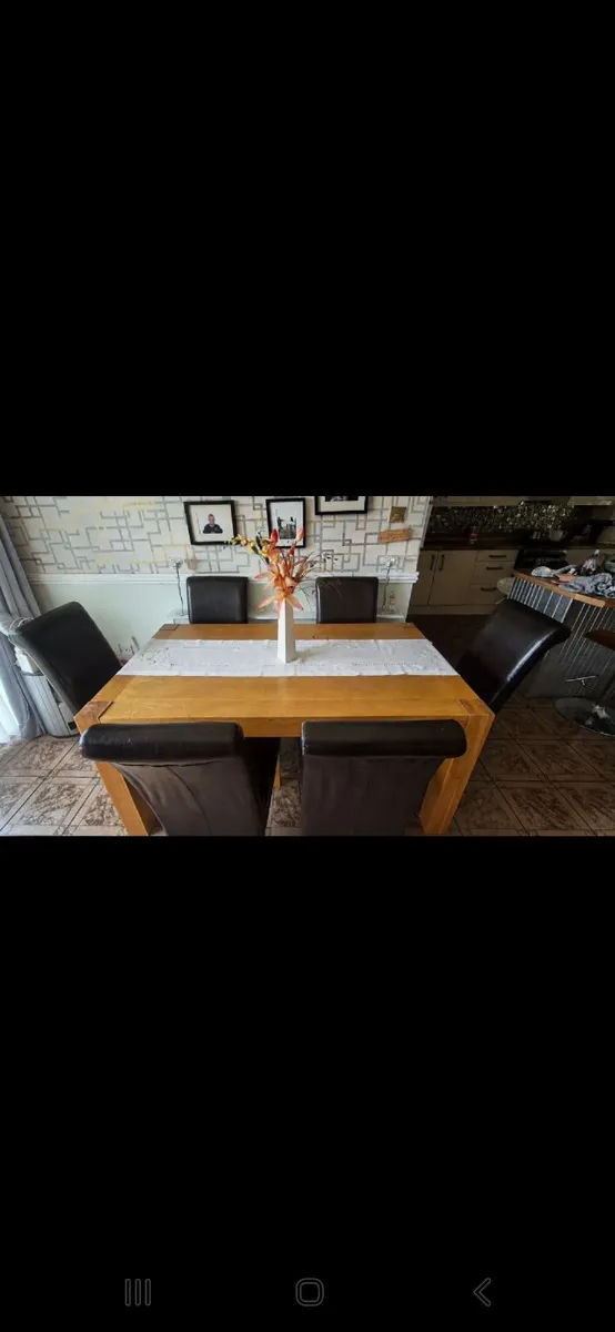 Solid Dining Table and 6 chairs - Image 1