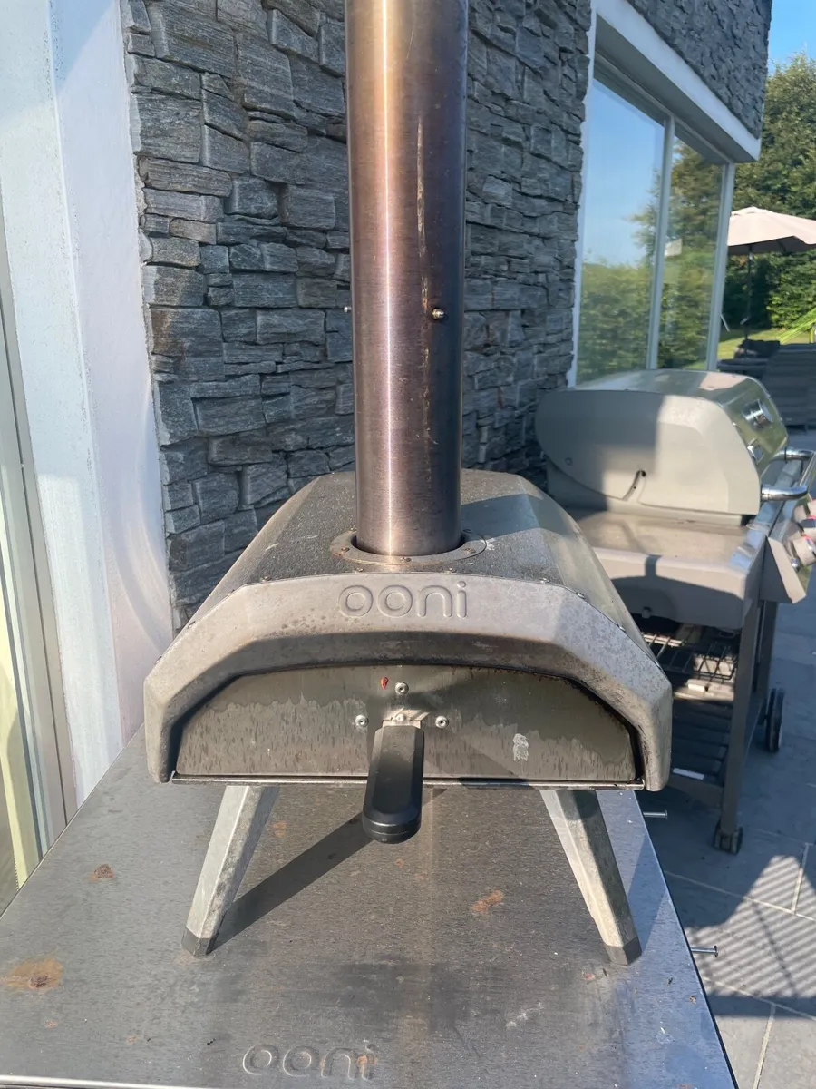 Onni wood pellet pizza oven with Ooni trolley - Image 1