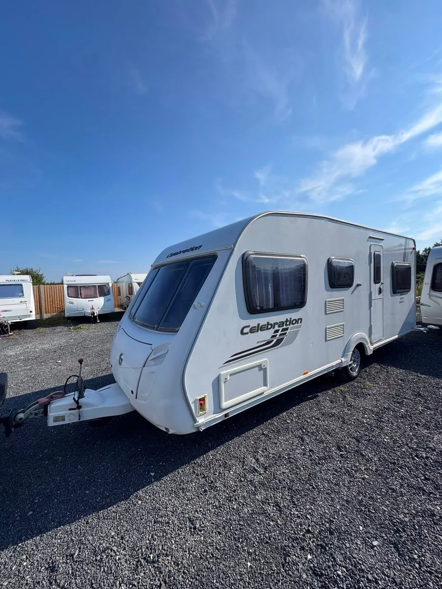2011 Swift 6 berth triple bunk caravan - Image 1