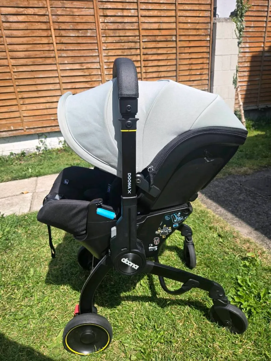 Doona x & isofix base - Image 1