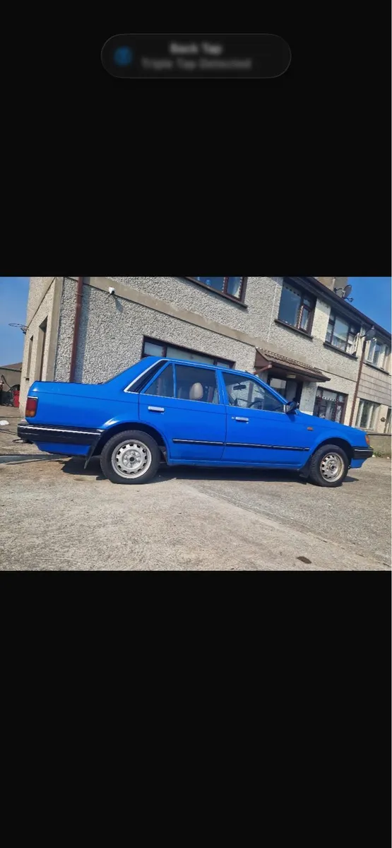 Mazda 323 - Image 1