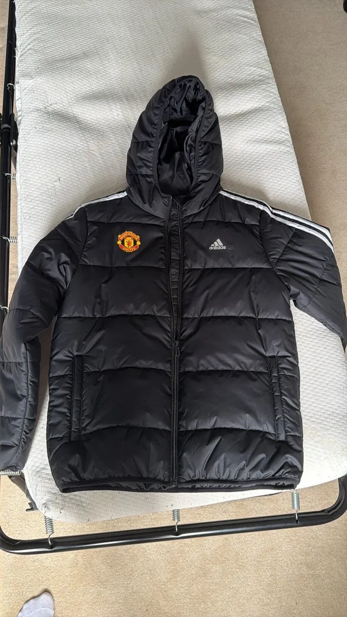 Adidas Man united kids black hooded puffer jacket - Image 1