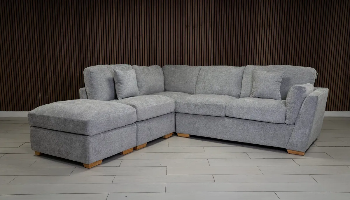 Emme L Shape Grey Fabric Sofa + Footstool - Image 1