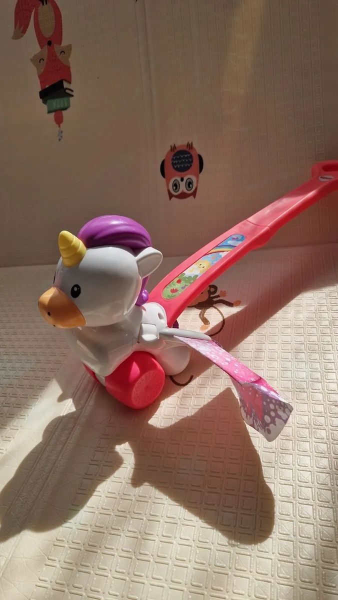 Fisher-Price Push & Flutter Unicorn, Pink Push Toy - Image 1