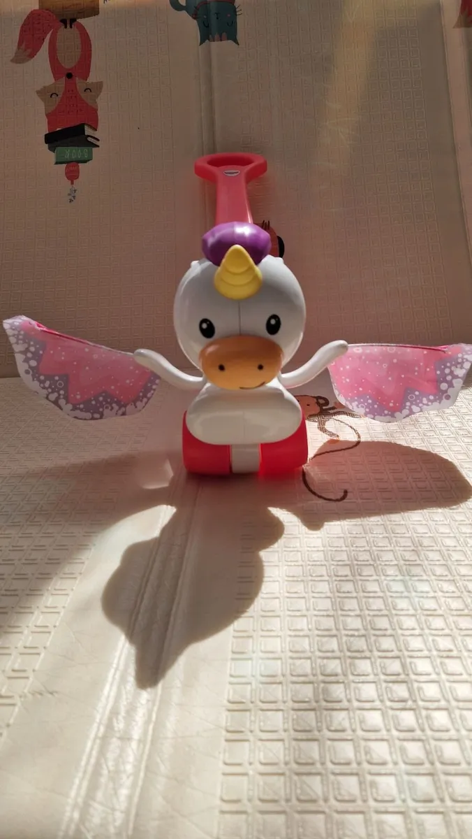 Fisher-Price Push & Flutter Unicorn, Pink Push Toy - Image 2