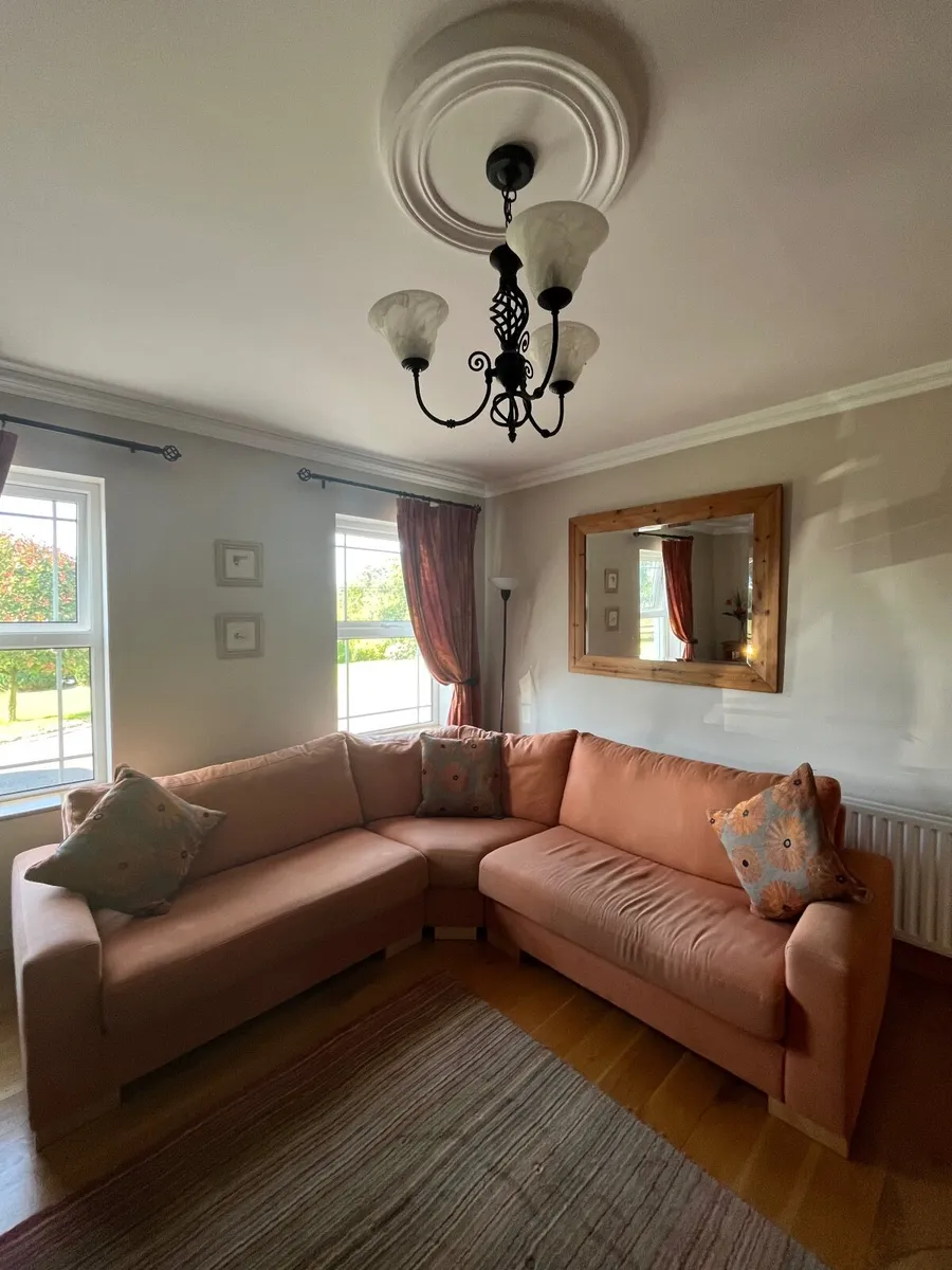 L- Shaped Orange Couch - Image 1