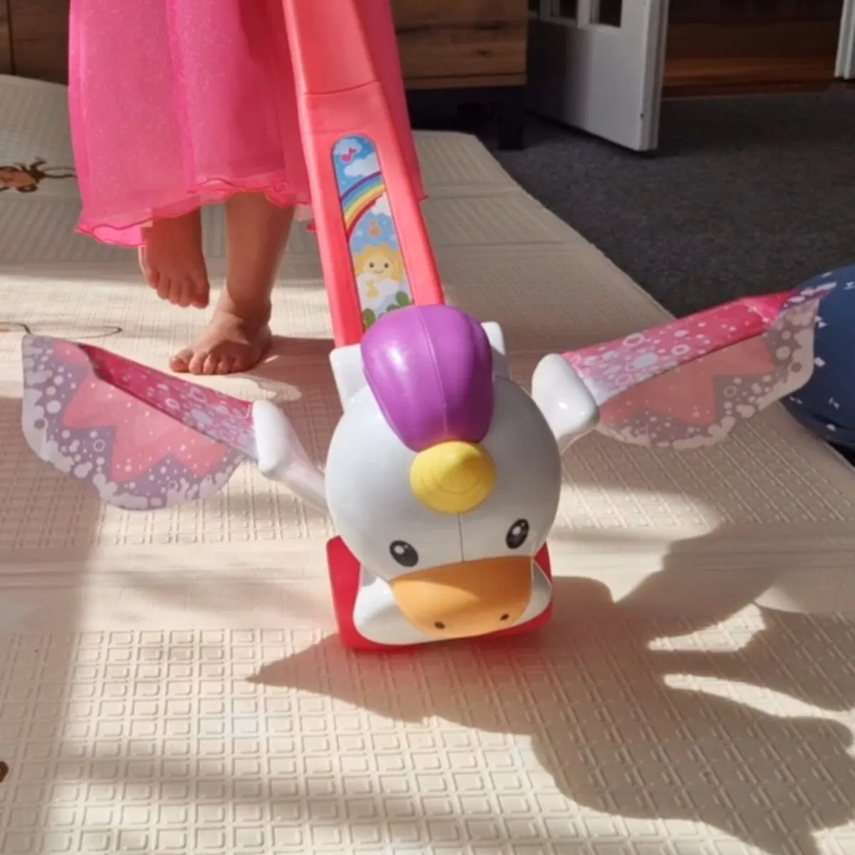 Fisher-Price Push & Flutter Unicorn, Pink Push Toy - Image 4