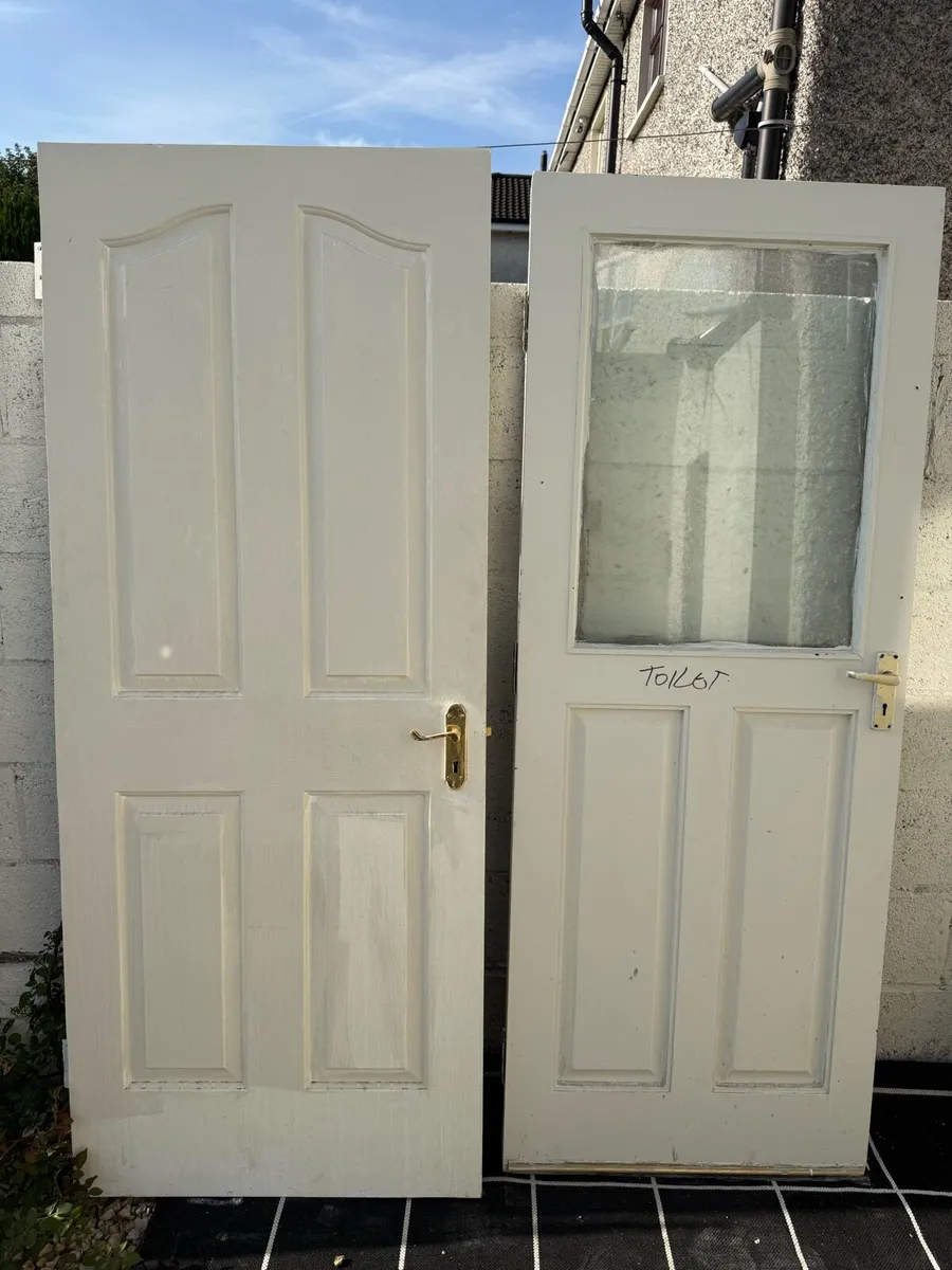 2 wooden doors 50 euros for both collection only