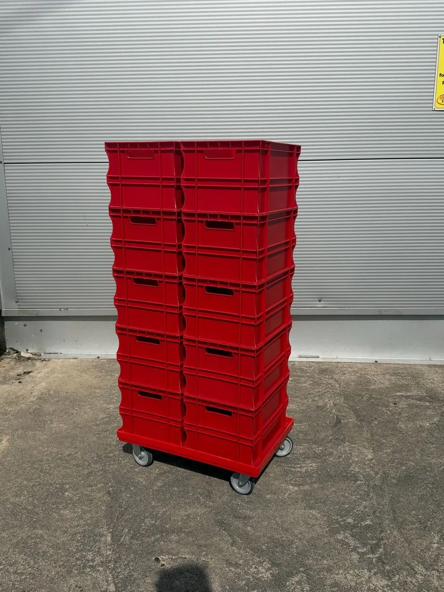 10x storage boxes & plastic dolly on wheels - Image 1