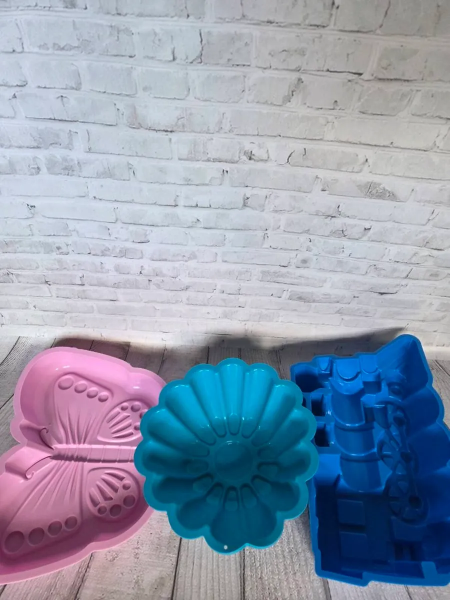 3 Novelty Silicone Cake Tins – Butterfly, Train & - Image 1