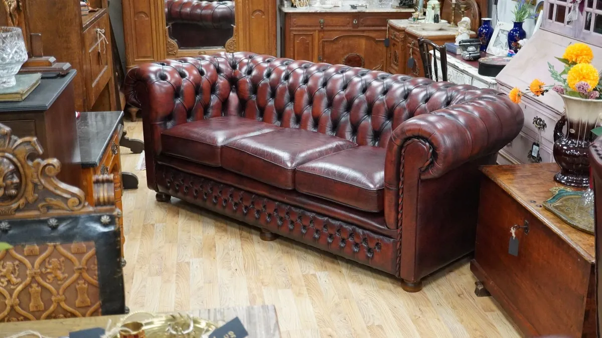 Oxblood Leather Chesterfield Three-Seater Sofa - Image 1