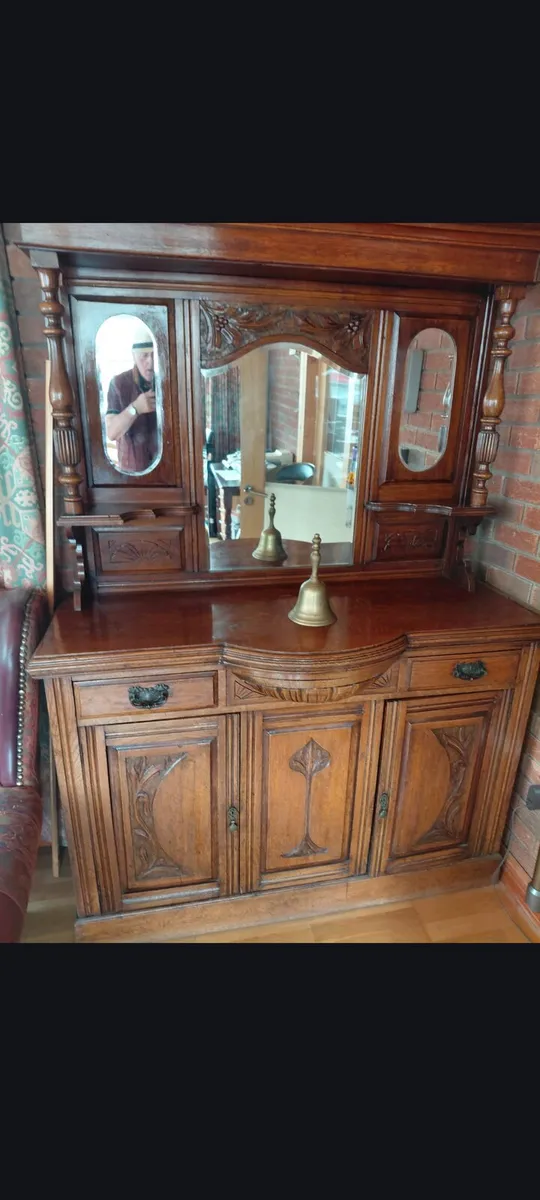 antique mirror-back sideboard