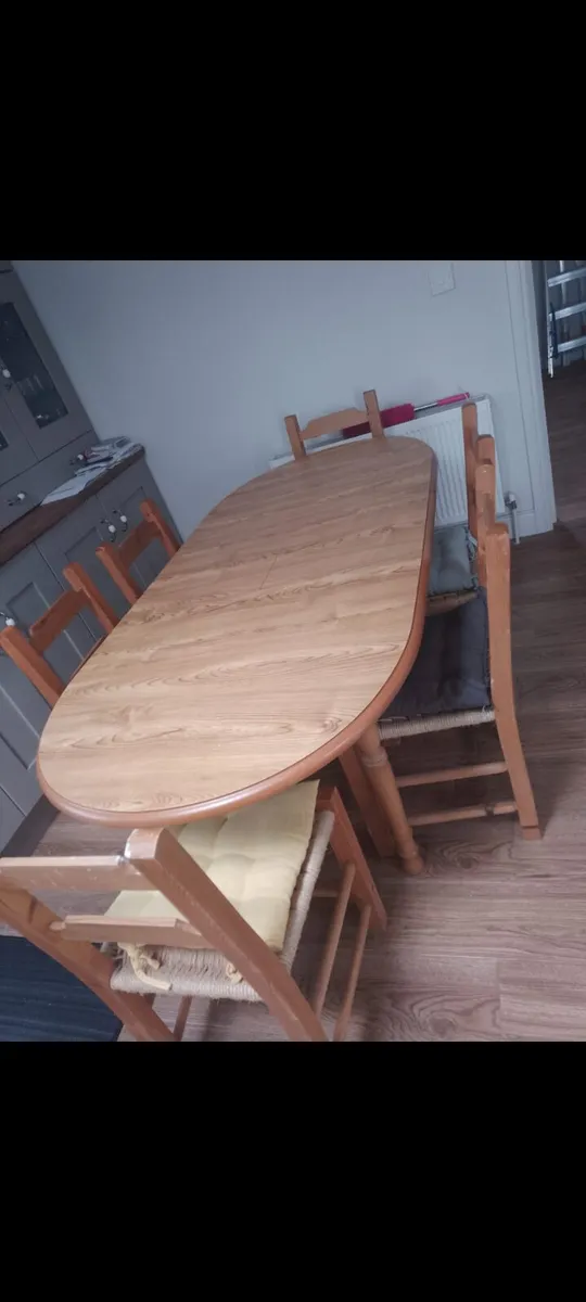 Table , 6 sugan chairs and bookshelf - Image 1