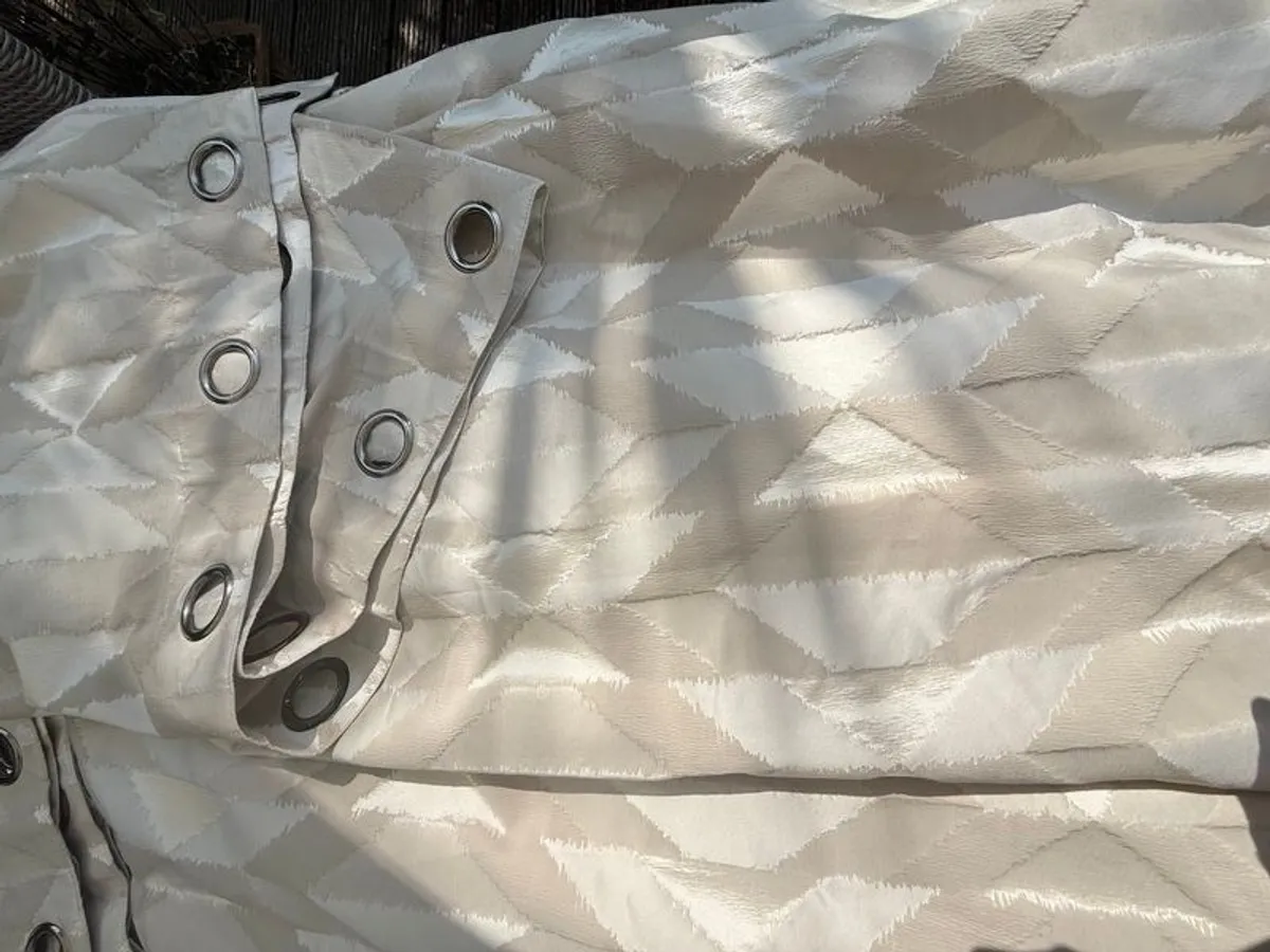 Luxurious heavyweight, blackout eyelet curtains. - Image 1