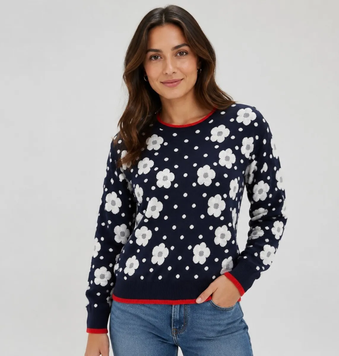 navy blue sweater features a white jacquard flower - Image 1