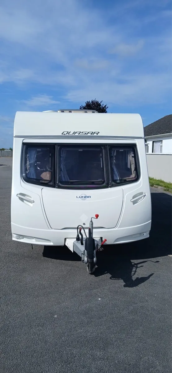 PRISTINE 4 BERTH LUNAR QUASAR TOURING CARAVAN. - Image 1