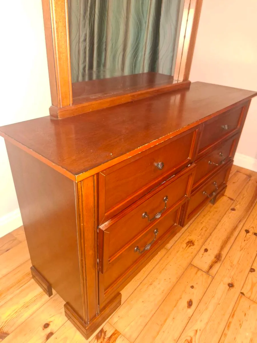 6 drawer dresser with mirror  mahogany in colour - Image 1