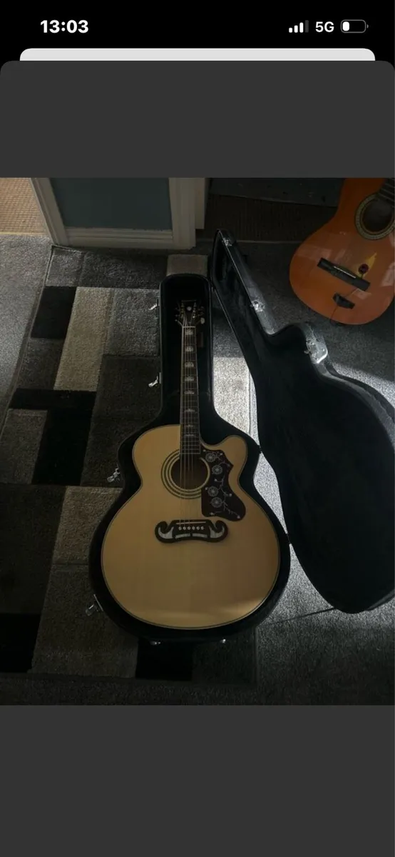 Acustic Guitar - Image 1