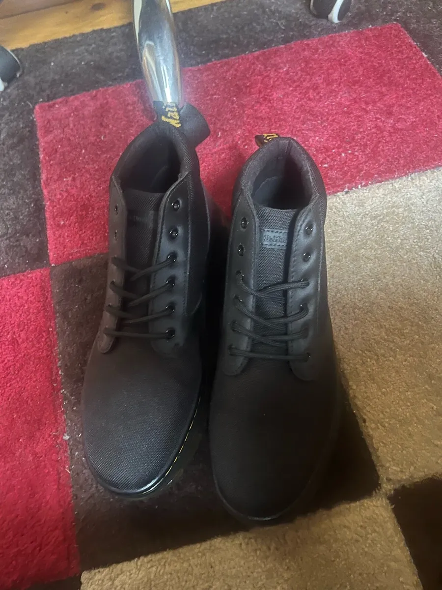 Dr. Martens 1460 Mono Vegan 8-Eye Boots in Black - Image 1