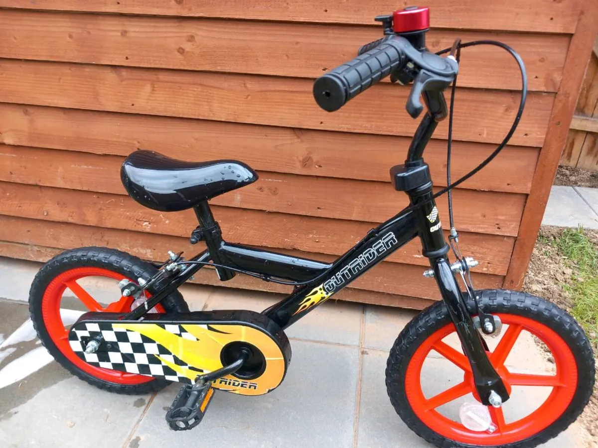Kids outrider bike size 14 inch wheels - Image 1