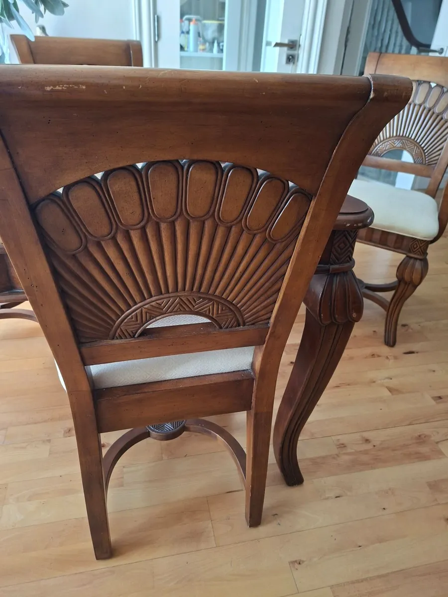 Dining  table, chairs,  and sideboard - Image 1
