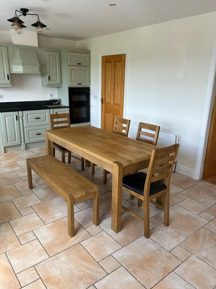 Solid Oak dining table and chairs - Image 1