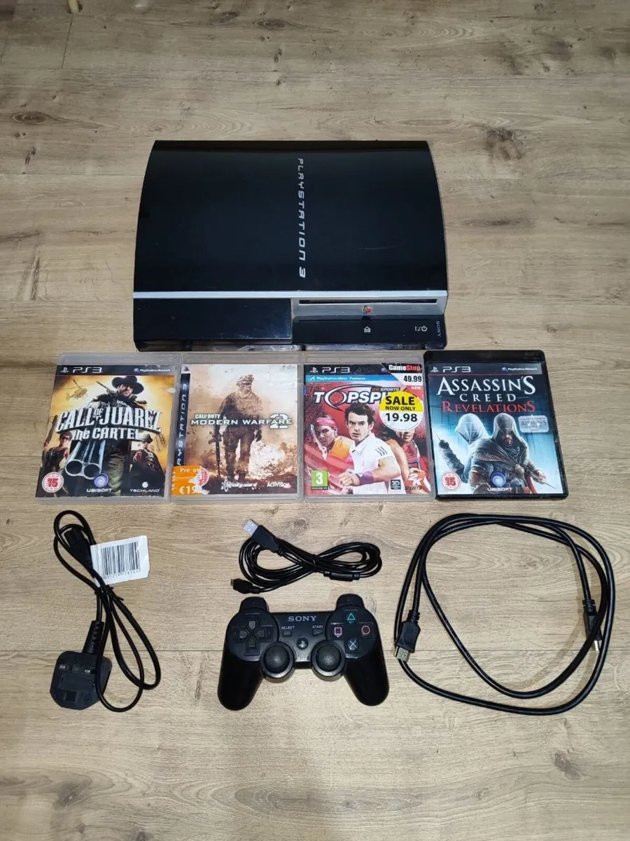 PlayStation 3 Fat 80Gb + Controller + 4 Games - Image 1