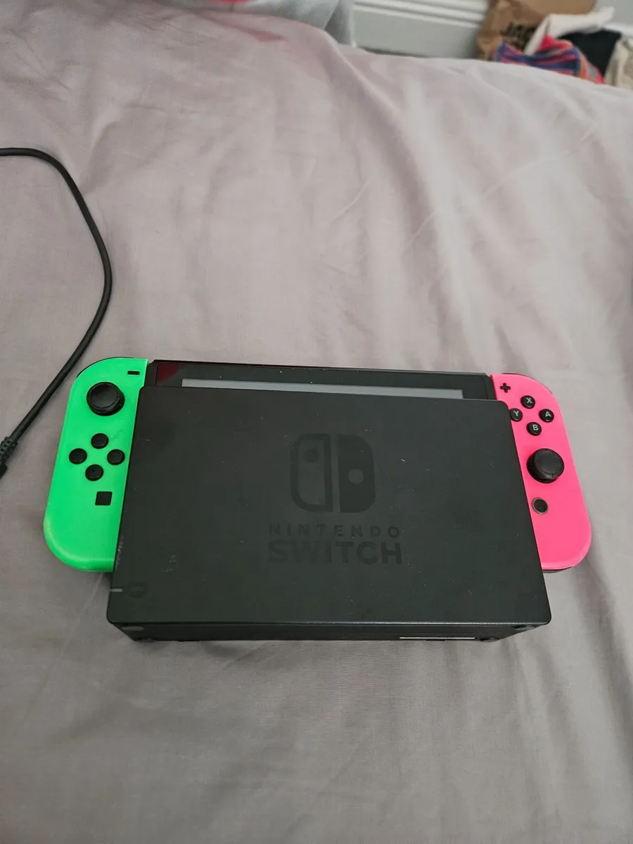 Nintendo Switch and some games for sale - Image 1