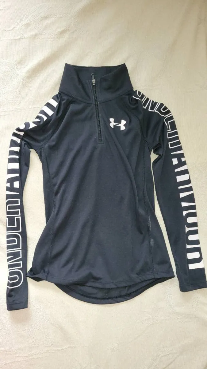 Under armour top for kids size M - Image 1