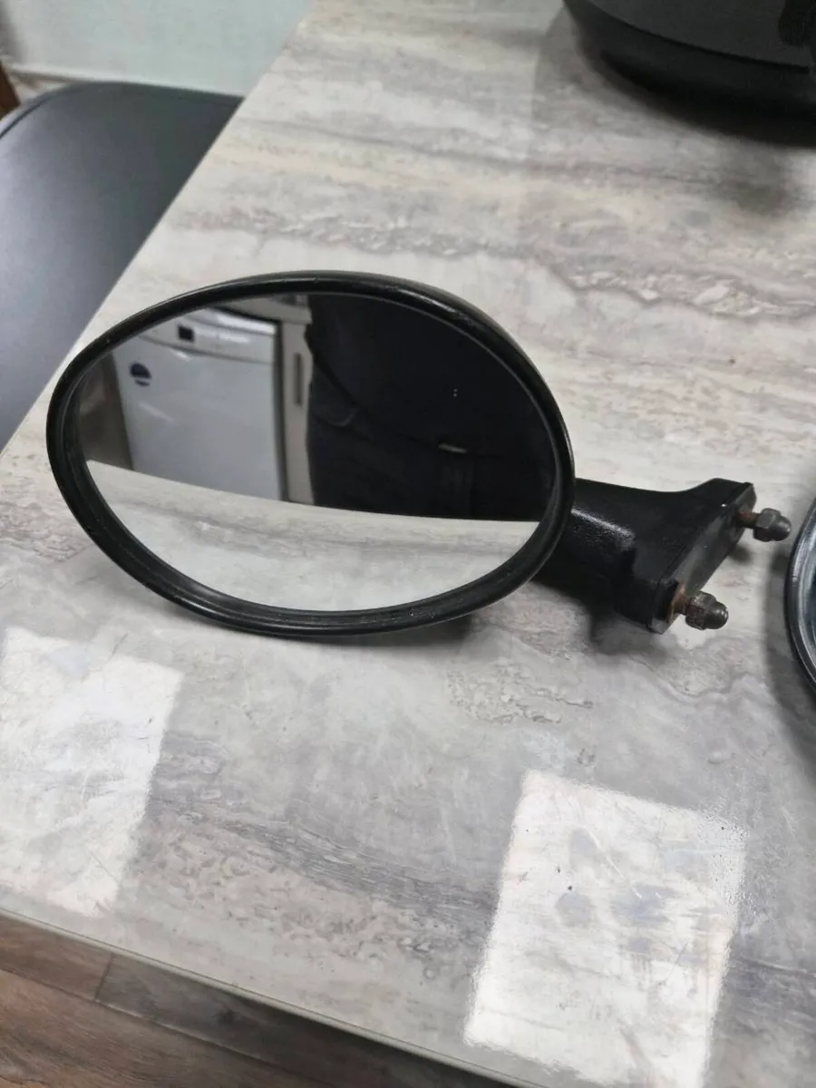 Mirrors and exhaust system. - Image 4